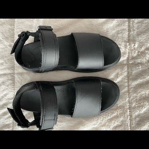 Dr. Marten’s platform black sandals, lightly worn but in amazing condition!